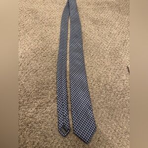 Croft and Barrow tie different shades of navy blue and gray checkered.